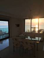 Luxury Apt in Konak Sea Side with a Sea front view and a private beach